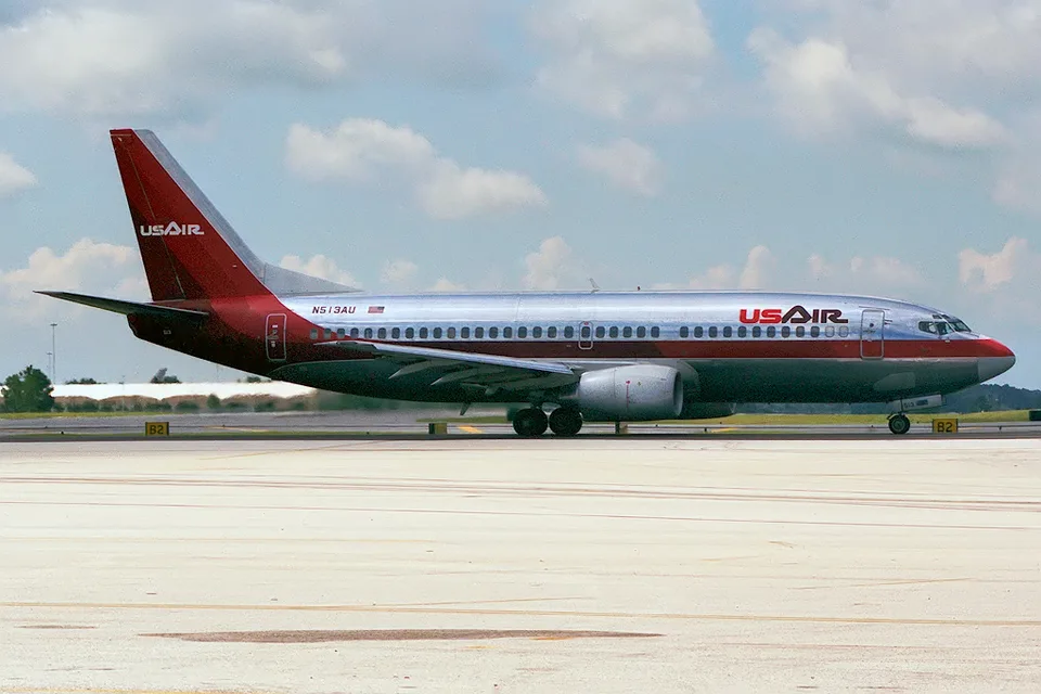 USAir Boeing 737 N513AU taxiing at Orlando in 1991.