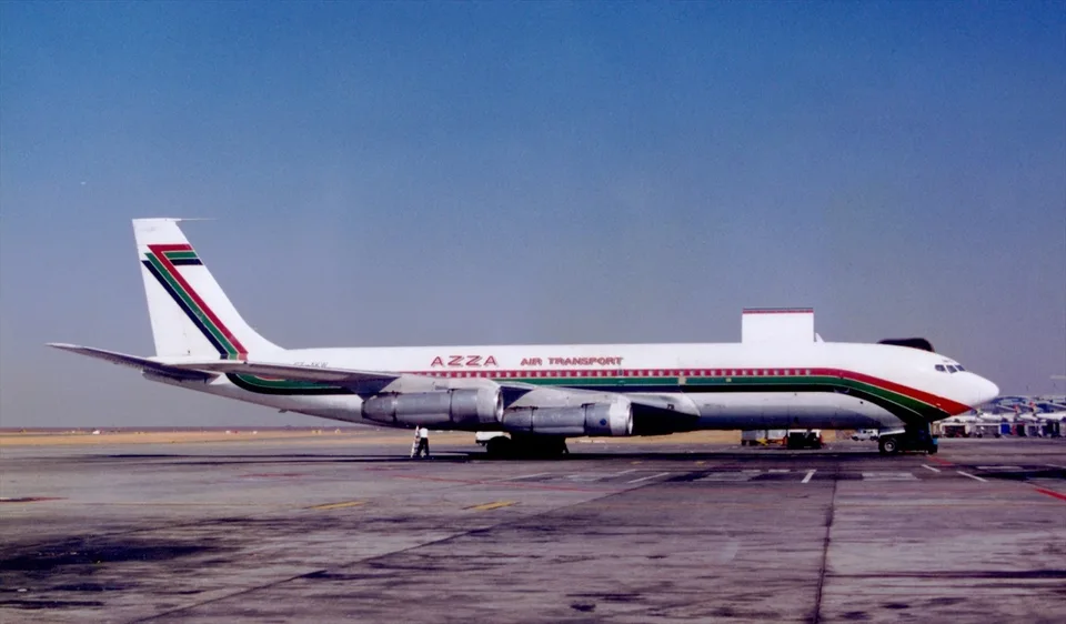 Boeing 707 ST-AKW parked on an apron in Azza Air Transport colours.
