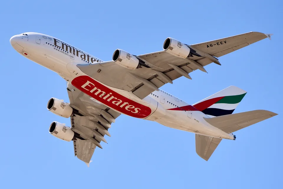 Emirates Airbus A380 A6-EEV in flight above Perth Airport.