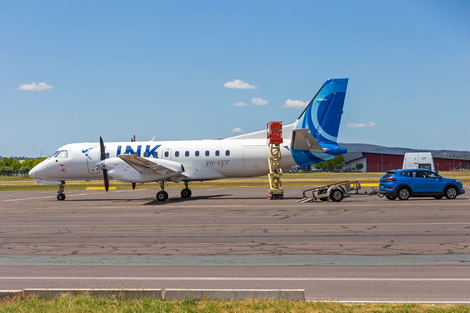 Link Airways Saab 340B VH-VEF parked at Canberra Airport.