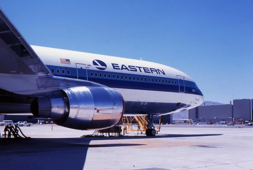 Eastern Air Lines L-1011 N329EA parked at Palmdale, showing the forward fuselage and left engine.
