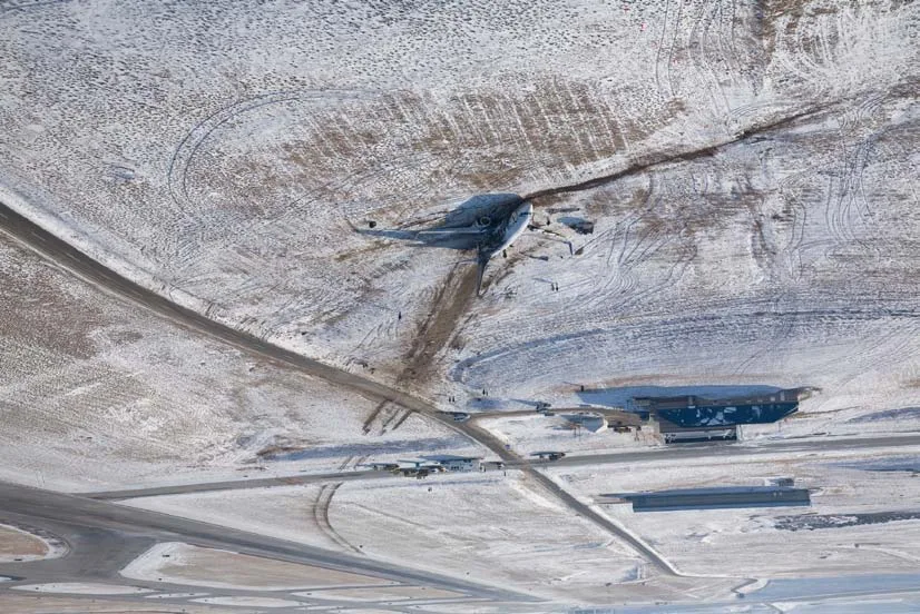 Aerial view of the Continental 1404 wreckage and ground scars west of Denver runway 34R.