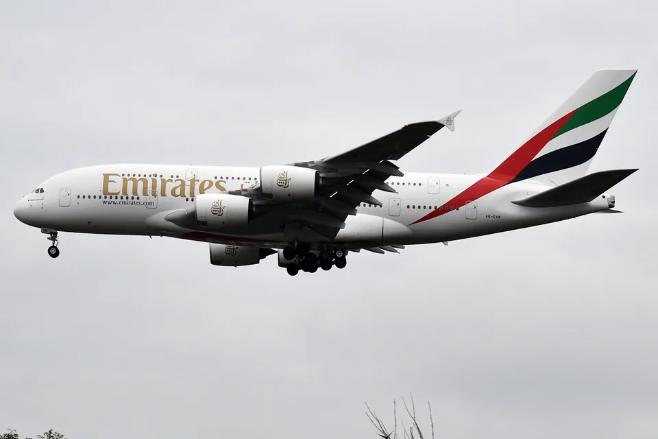 Emirates Airbus A380 A6-EVK with landing gear extended.