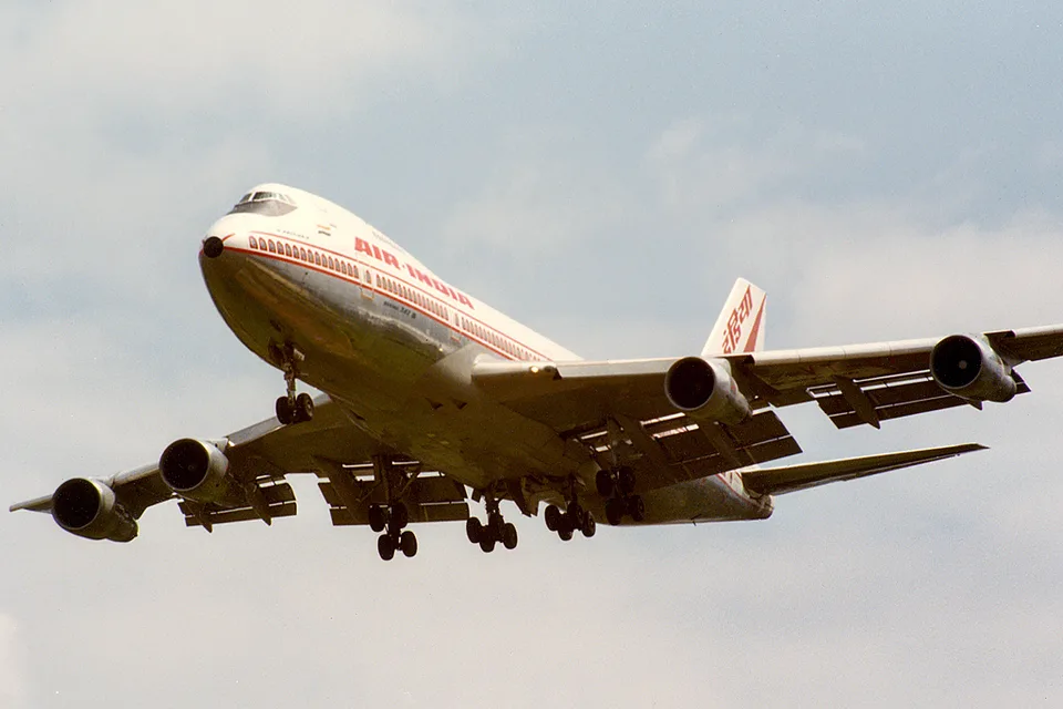 Air India Boeing 747 VT-EFO approaching Heathrow with its landing gear extended.