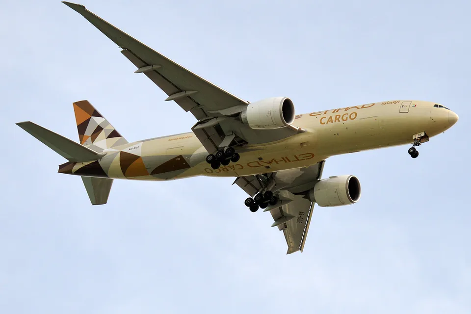 Etihad Cargo Boeing 777 A6-DDE airborne with its landing gear extended.