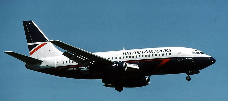 G-BGJL in British Airtours colours airborne with its landing gear extended.