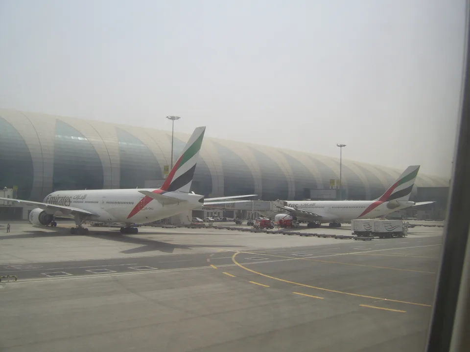 Emirates Boeing 777 A6-EMJ parked beside the terminal at Dubai in 2009