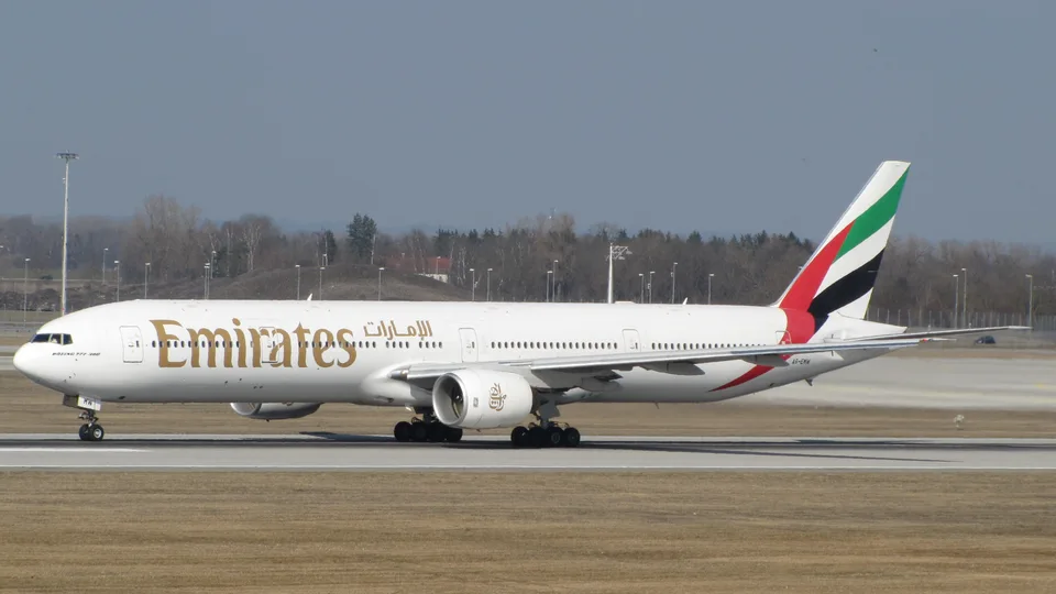 Emirates Boeing 777 A6-EMW taxiing at Munich Airport.