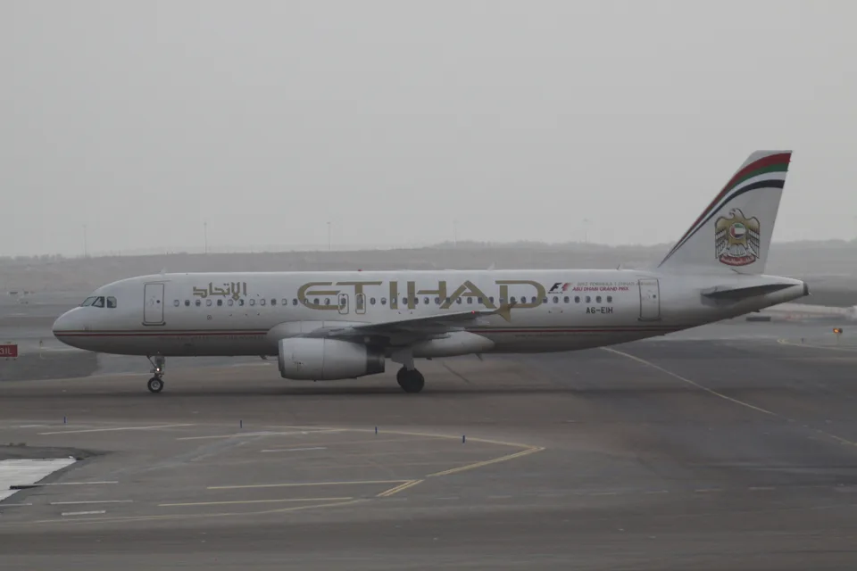 Etihad Airbus A320 A6-EIH on the apron at Abu Dhabi.