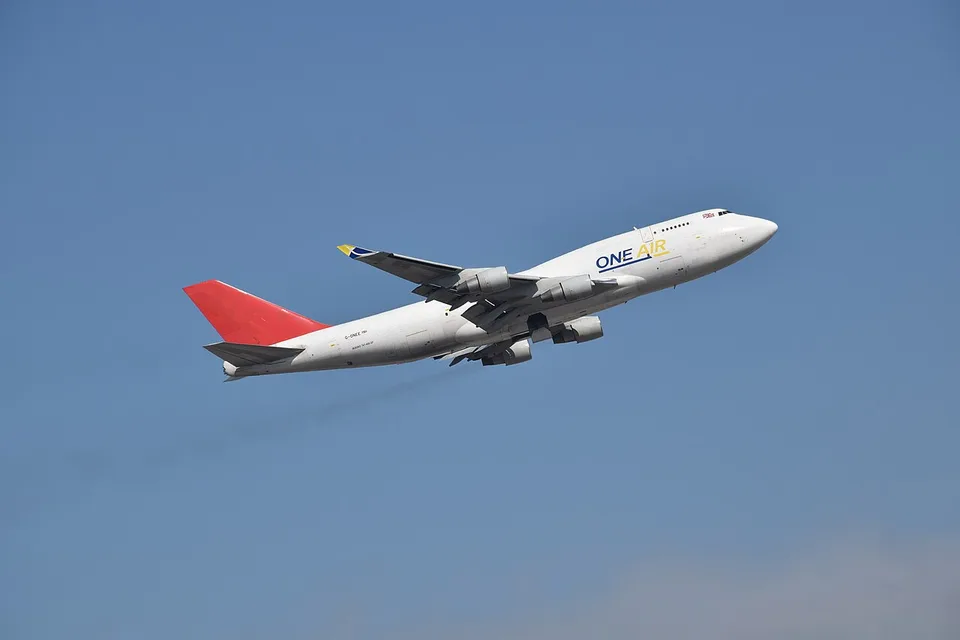 G-ONEE Boeing 747 freighter departing Hong Kong