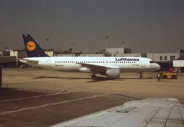 Lufthansa A320 D-AIPN parked on the apron at Heathrow in 1991.