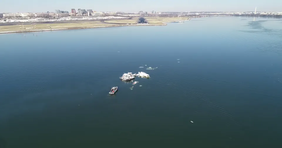 Aerial view of wreckage recovery operations on the Potomac near Washington National.