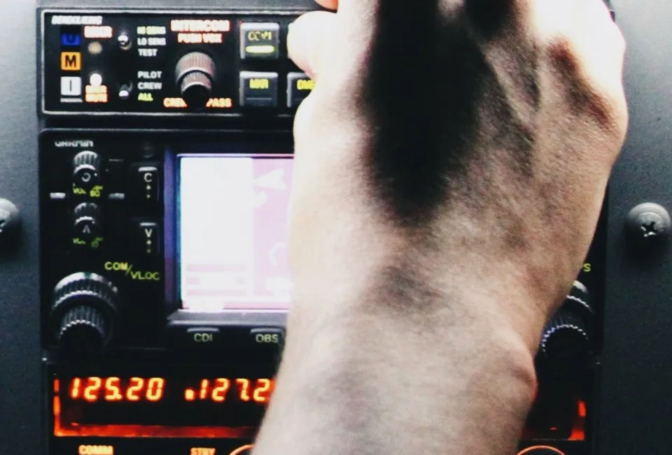 Cockpit radio controls in a representative photograph